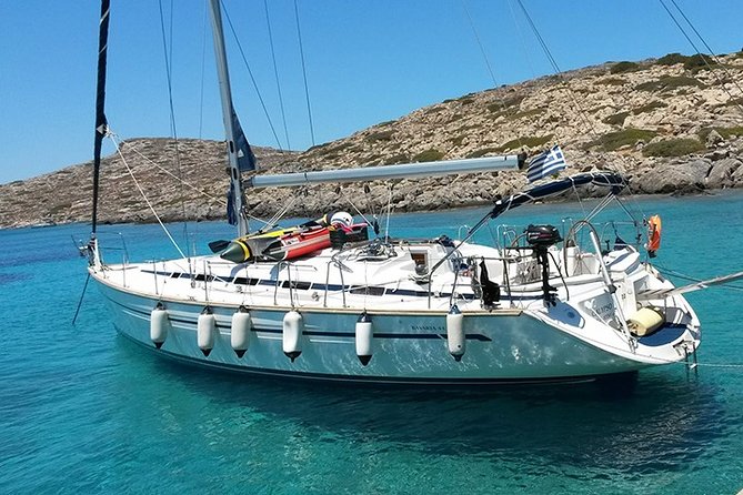 Guests relaxing on a sailing boat on the Cretan waters